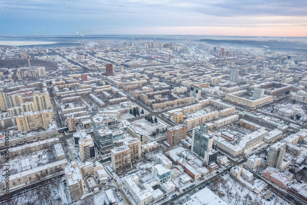 Yekaterinburg aerial panoramic view at Winter in cloudy day. Pervomaiskaya and Lunacharskogo streets