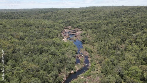 Stony Creek Flowing Through Tropical Forest In Girringun National Park In QLD, Australia. - aerial photo