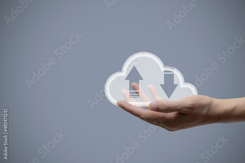 Cloud computing on man hand. Idea concept for the cloud business, big data analytics, data storage, cloud network, data transfer, intelligent technology.