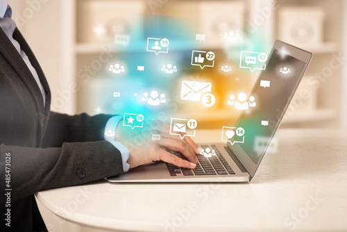 Wallpaper Mural Young person surfing on social media network Torontodigital.ca