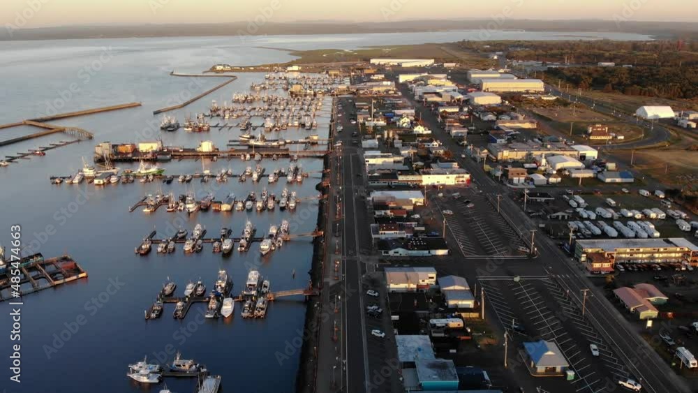 Aerial sunset view of Westport oregon, harbor with yacht and boat