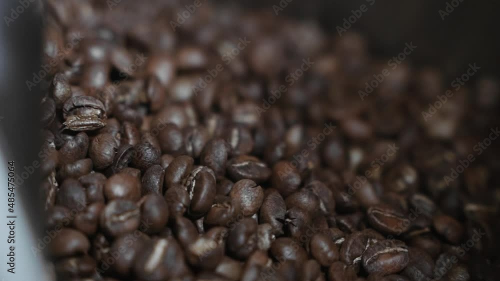 Coffee beans roasting process at a cafe Coffee beans roasting process at a cafe