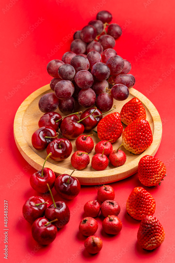 fruits in red color on red background fruits in red color on red background