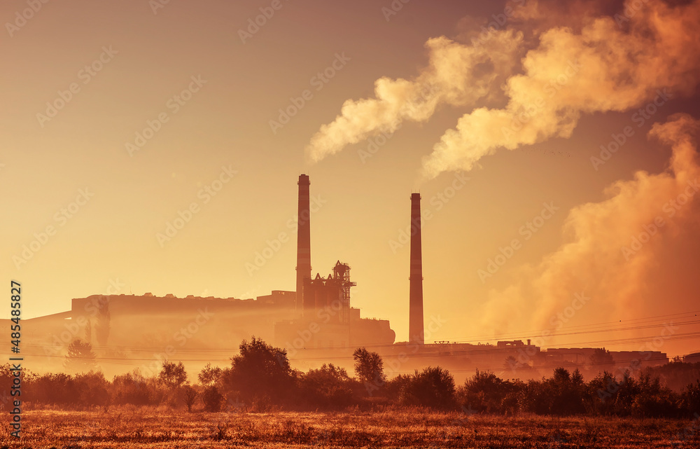 Power station with smoking chimney