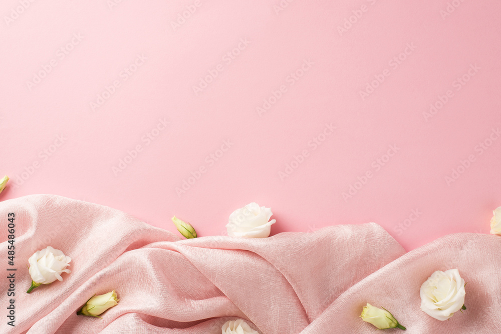 Top view photo of woman's day composition pink soft cloth and white prairie gentian flower buds on isolated pastel pink background with copyspace Top view photo of woman's day composition pink soft cloth and white prairie gentian flower buds on isolated pastel pink background with copyspace