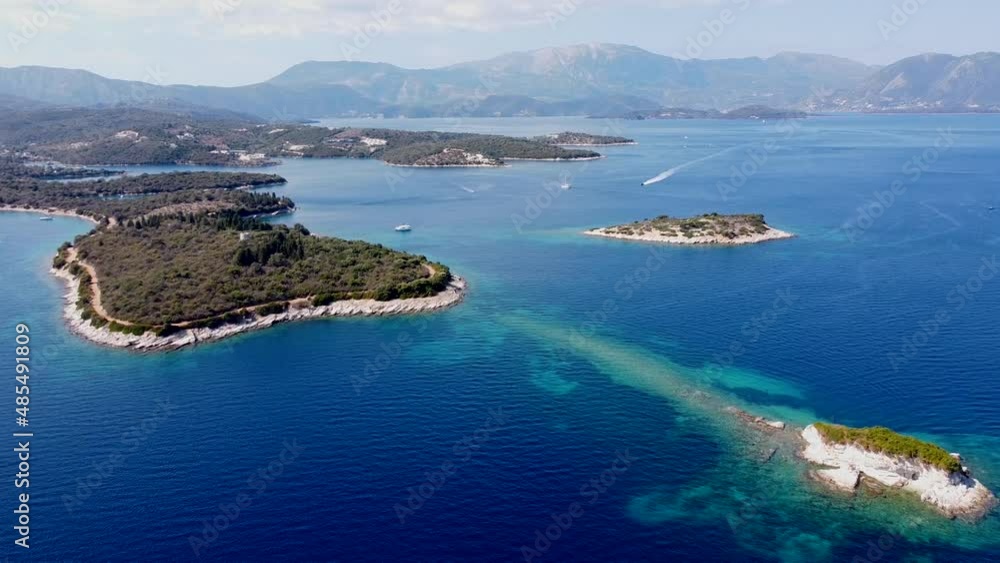 Meganisi Island, Lefkas, Greece - Aerial Drone View of (Sail)Boats, Jetski, Mountains and Blue Sea Meganisi Island, Lefkas, Greece - Aerial Drone View of (Sail)Boats, Jetski, Mountains and Blue Sea
