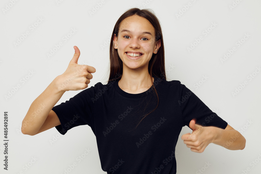 young woman long hair black t-shirt emotion Lifestyle unaltered young woman long hair black t-shirt emotion Lifestyle unaltered