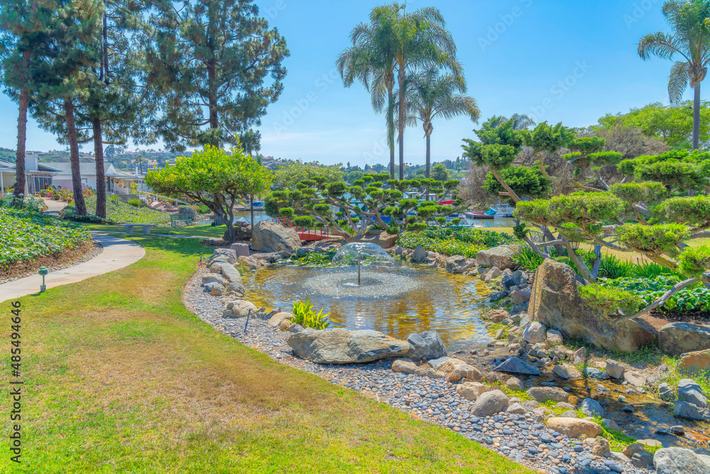 Small garden park with fountain in a small pond at San Marcos, San Diego, California