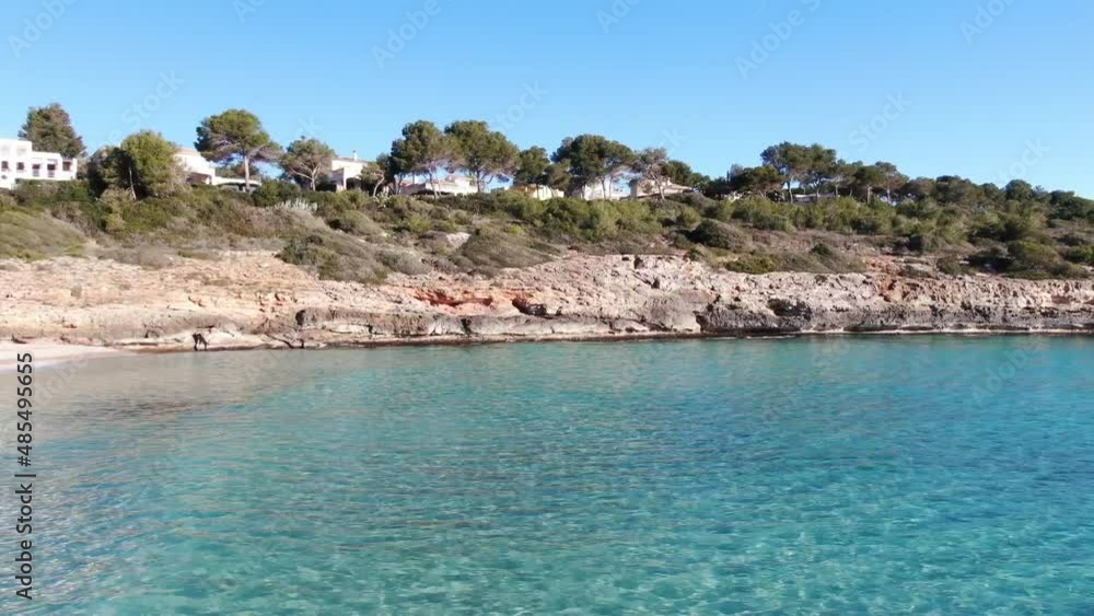 Cala Mandia. Beautiful view of the seacoast of Majorca with an amazing turquoise sea, in the middle of the nature. Concept of summer, travel, relax and enjoy Cala Mandia. Beautiful view of the seacoast of Majorca with an amazing turquoise sea, in the middle of the nature. Concept of summer, travel, relax and enjoy
