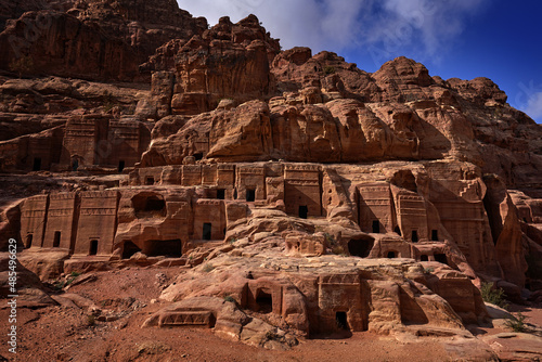 Temples and tombs in Petra. Sunny day with blue sky in historical sight in Arabia. Petra in Jordan.