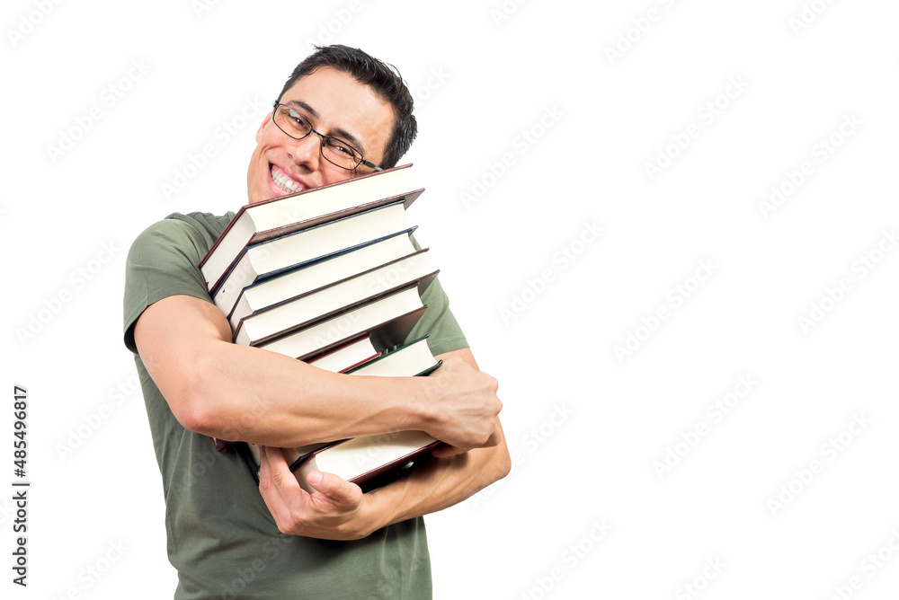 Optimistic nerdy man embracing stack of books Optimistic nerdy man embracing stack of books