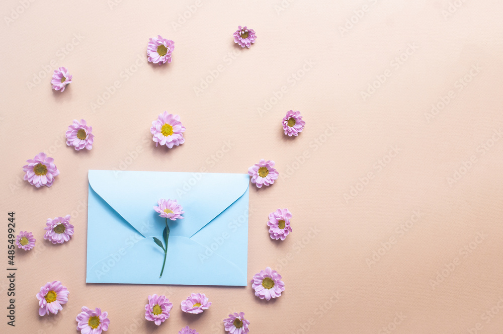 Beautiful light purple flower  on light yellow background copy space valentine's day spring concept