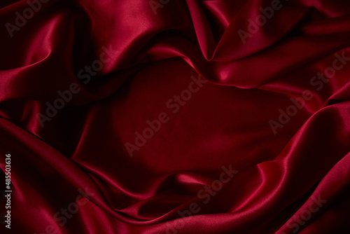 Beautiful draped silk fabric in red.