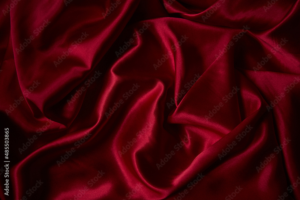 Obraz premium Beautiful draped silk fabric in red.