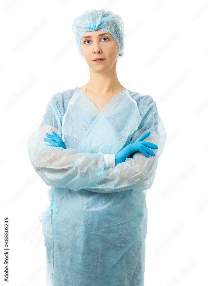 medical worker. portrait of a woman in sterile clothing, a nurse, a doctor in a dressing gown, hat, gloves look at us. isolated medical worker. portrait of a woman in sterile clothing, a nurse, a doctor in a dressing gown, hat, gloves look at us. isolated