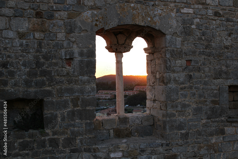 detail of a window of the Rocca San Silvestro located in the medieval