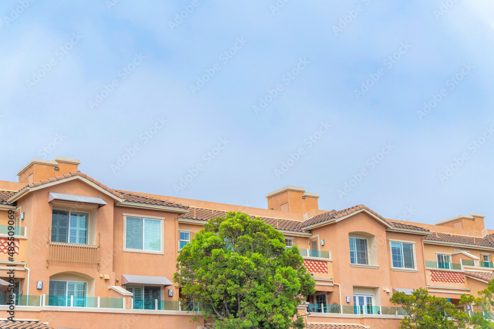Complex apartment building with glass railings on the balconies at Carlsbad, San Diego, California Complex apartment building with glass railings on the balconies at Carlsbad, San Diego, California