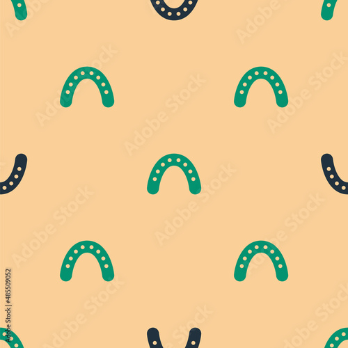 Green and black Mouth guard boxer icon isolated seamless pattern on beige background. Vector
