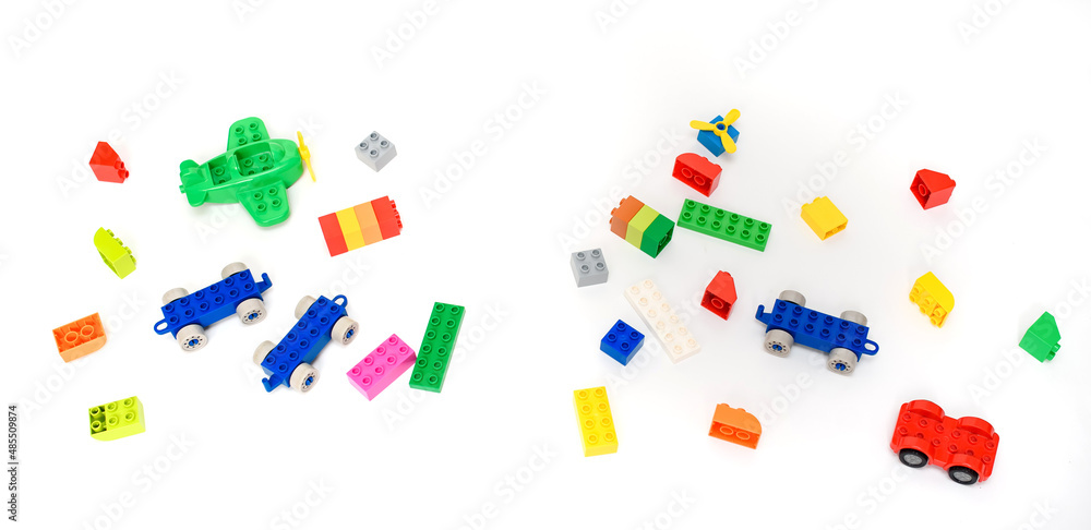 Close up kid boy hands playing with toys black on white background. Close up kid boy hands playing with toys black on white background.
