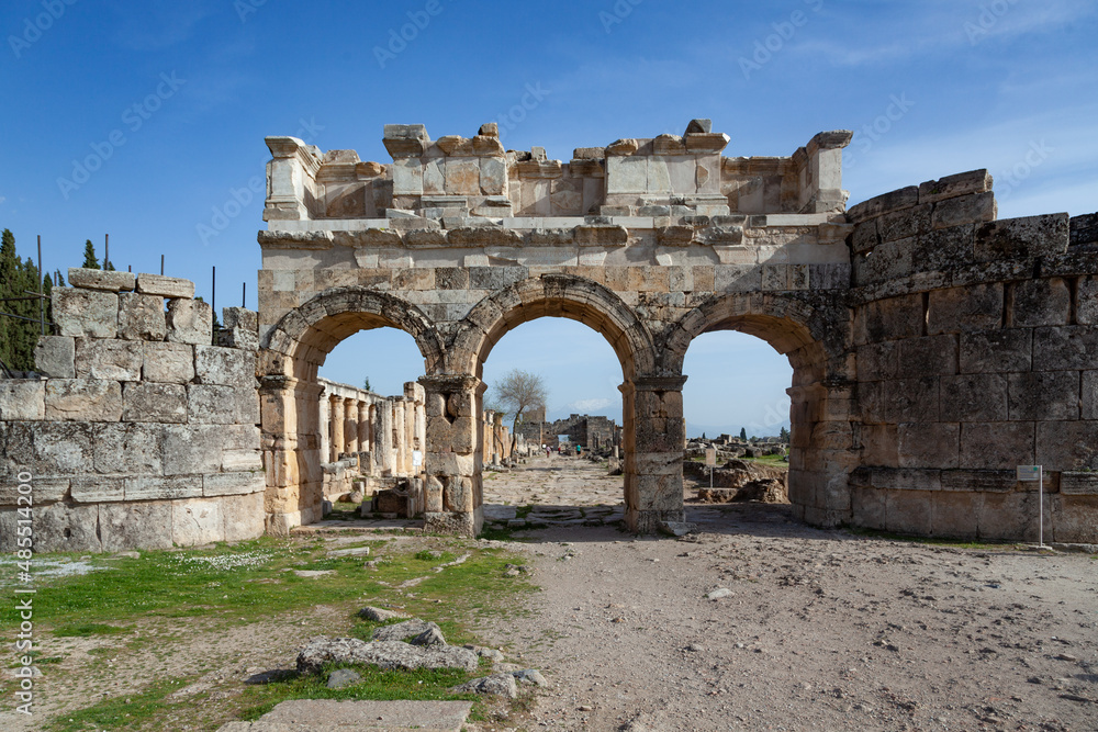 Pamukkale, Denizli, Turkey: April 03 2016: Domitian gate and Frontinus street in Hierapolis 