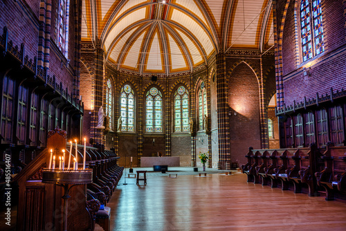 Obraz na płótnie Burning candles in the inside of a church in a monastery in Deventer