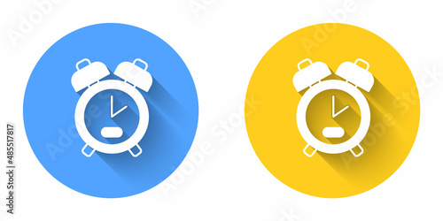 White Alarm clock icon isolated with long shadow background. Wake up, get up concept. Time sign. Circle button. Vector