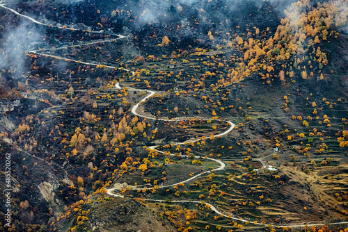 Russia, Dagestan, Gunib, Winding mountain road in autumn photo