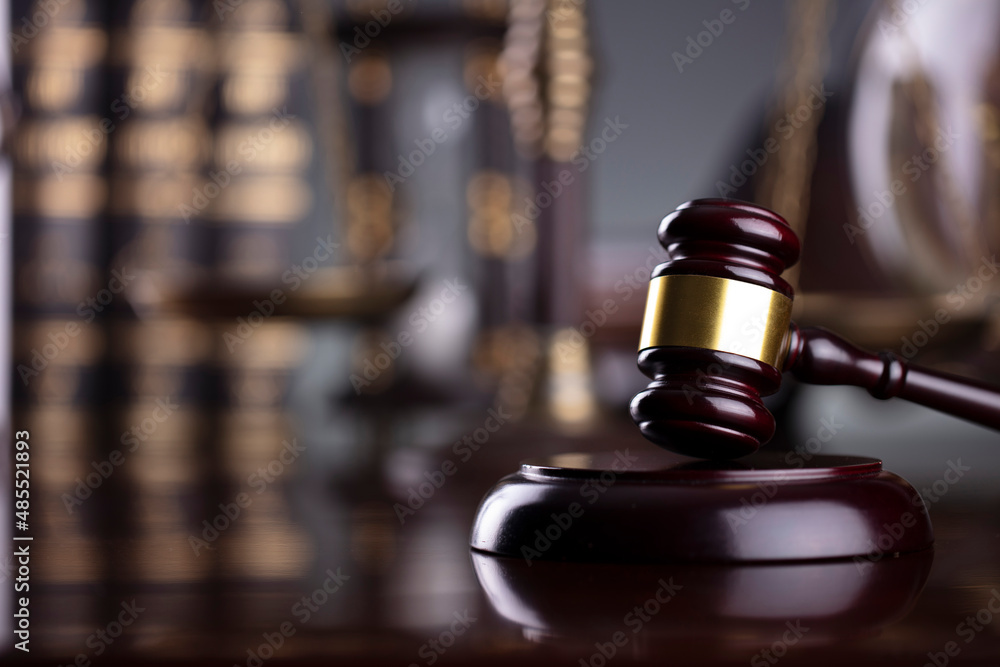 Lawyer office. Law symbols composition: judge’s gavel, Themis sculpture, legal books and scale. Lawyer office. Law symbols composition: judge’s gavel, Themis sculpture, legal books and scale.