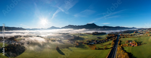 Austria, Upper Austria, Mondsee, Drone panorama ofSalzkammergut at foggy autumn sunrise