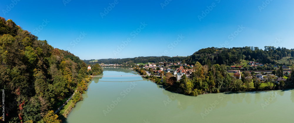 Austria, Upper Austria, Wernstein am Inn, Panoramic view of river Inn in summer with Mariensteg bridge in background Austria, Upper Austria, Wernstein am Inn, Panoramic view of river Inn in summer with Mariensteg bridge in background
