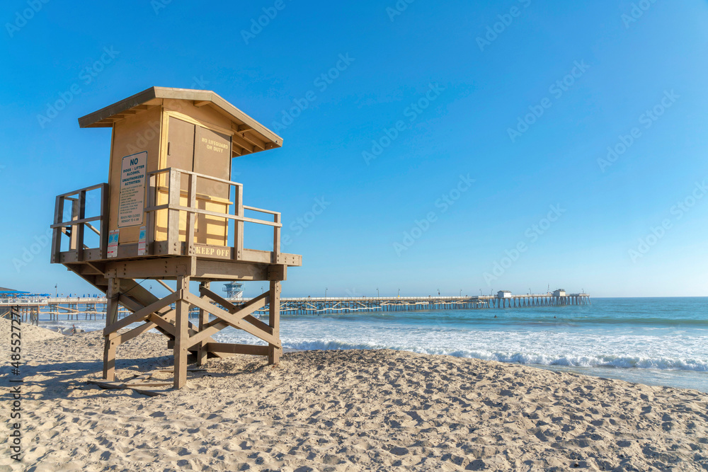 Lifeguard house against the view of the ocean and pier at San Clemente, California