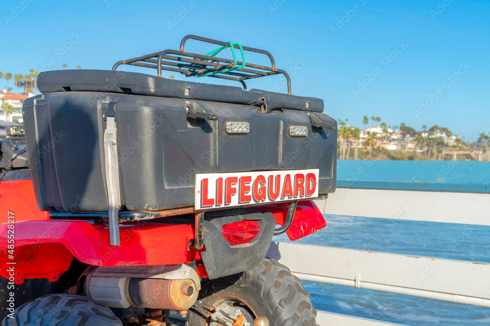 Box at the back of a lifeguard quad bike at San Clemente, California Box at the back of a lifeguard quad bike at San Clemente, California