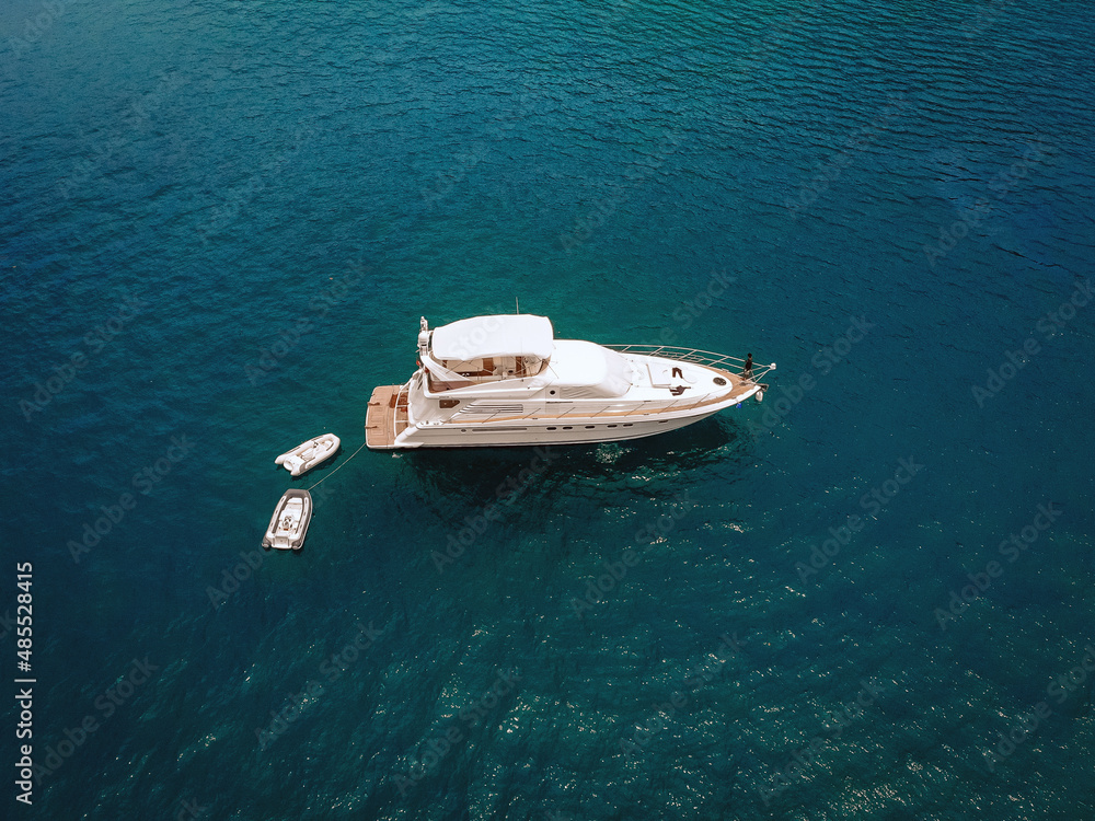 Bird eye view of the amazing white yacht in the Andaman sea; vessels concept.