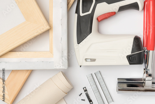 Tools for stretching canvas on a wooden stretcher. Printing photos on canvas, top view
