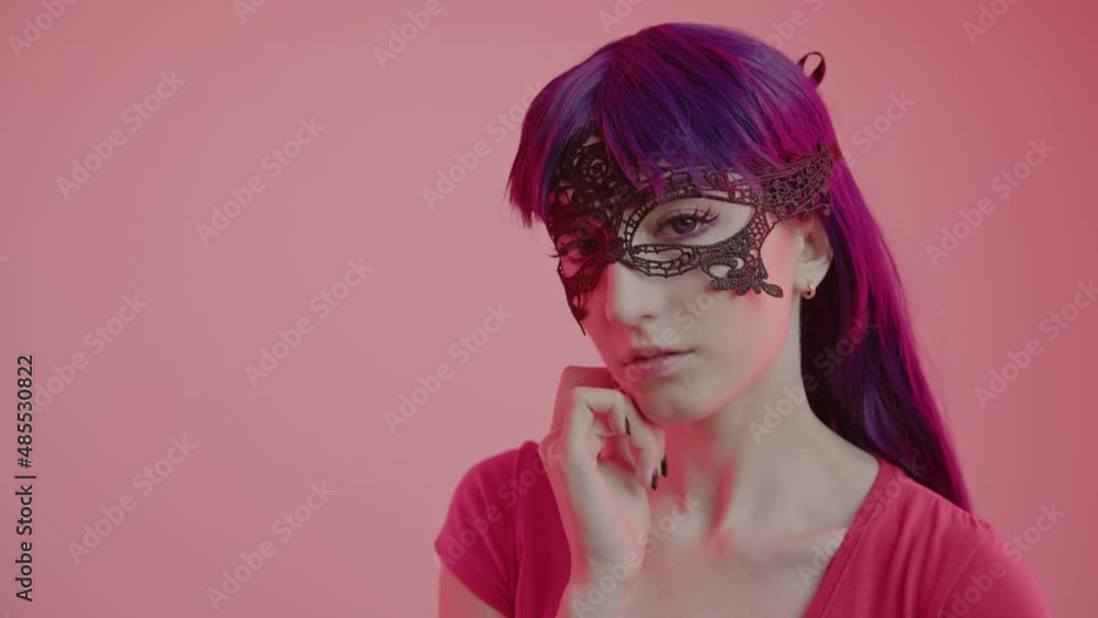 Sensualistic young caucasian girl touches her face in a slightly erotic way and gazes softly at the camera medium close-up shot. High quality 4k footage Sensualistic young caucasian girl touches her face in a slightly erotic way and gazes softly at the camera medium close-up shot. High quality 4k footage