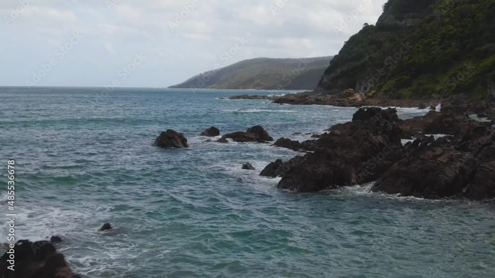 4K Aerial rocks in the water near the coast - Drone dolly in shot 4K Aerial rocks in the water near the coast - Drone dolly in shot