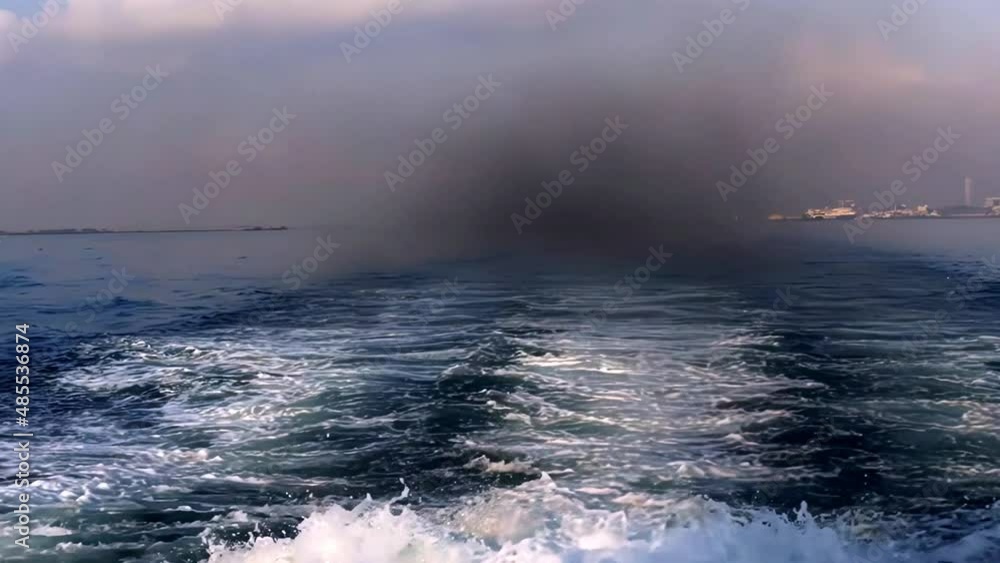 Typical exhaust smoke, wake and turbulence produced by a sailing ship or ferry. Typical exhaust smoke, wake and turbulence produced by a sailing ship or ferry.