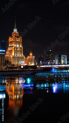 night view of the city with river and boat