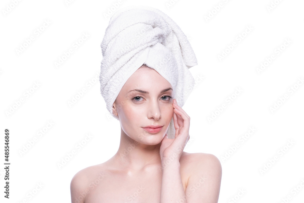 Beautiful woman with clean fresh skin touching her face. Face care treatment. Natural healthy cosmetic beautiful serious female portrait manicure hand. Cosmetology, beauty and spa looking at camera Beautiful woman with clean fresh skin touching her face. Face care treatment. Natural healthy cosmetic beautiful serious female portrait manicure hand. Cosmetology, beauty and spa looking at camera
