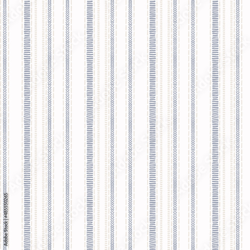Seamless French country kitchen stripe fabric pattern print. Blue yellow white vertical striped background. Batik dye provence style rustic woven cottagecore textile. 