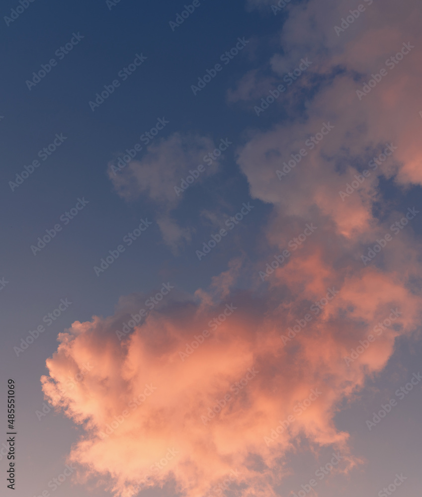 Beautiful bright sunset sky with pink and purple clouds, abstract nature cloudscape background