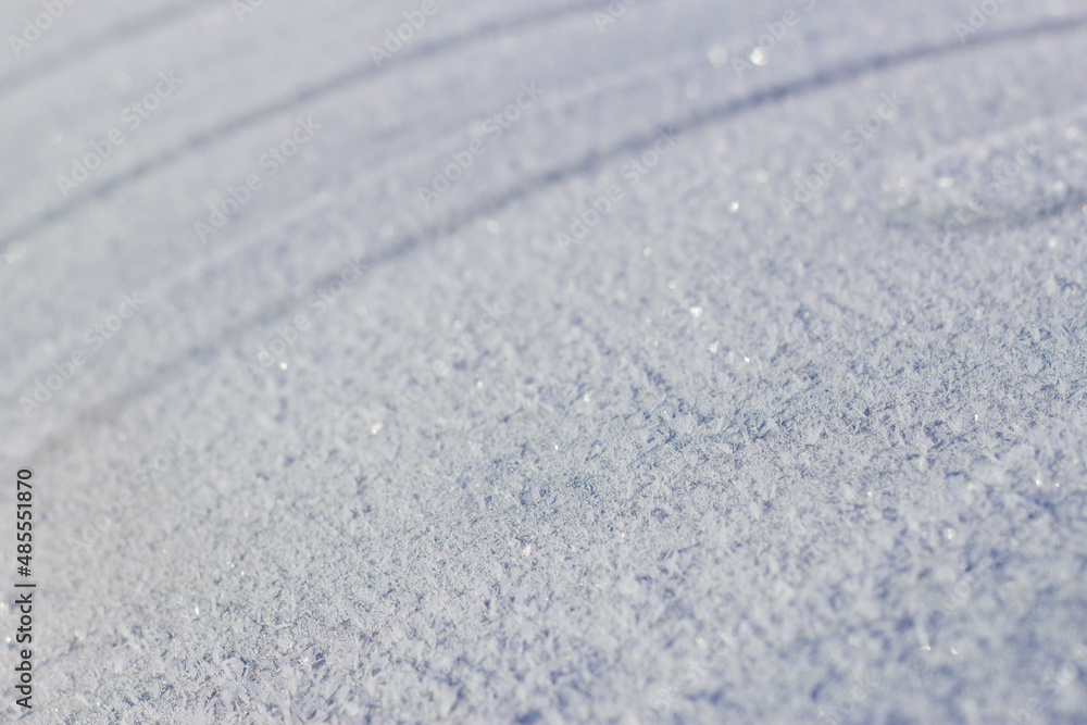 Obraz premium hoarfrosted metal surface in winter sunny day