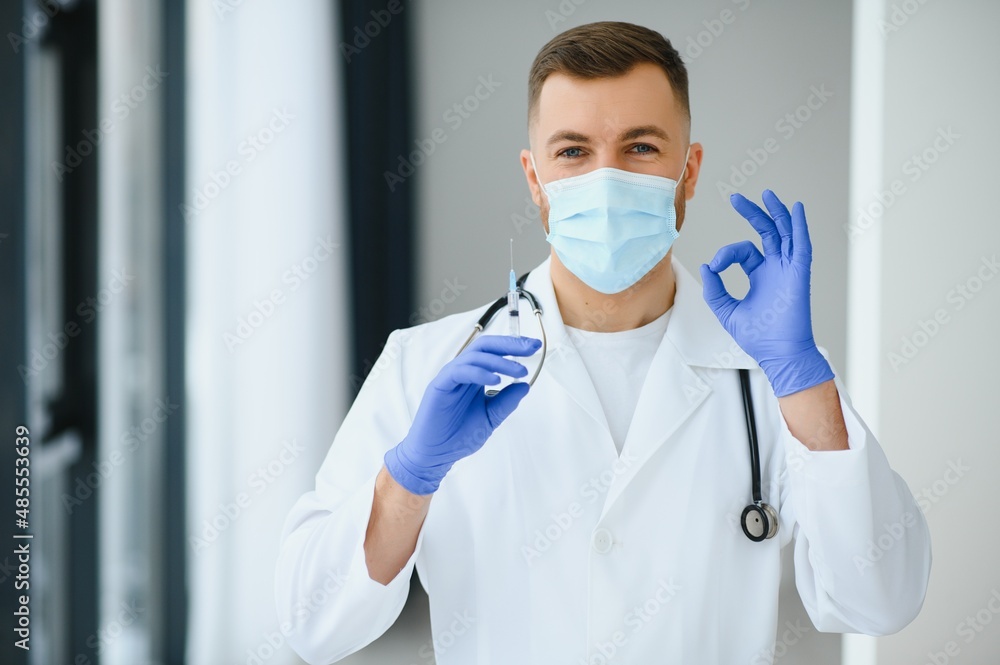 Portrait of male doctor wearing surgical mask is ready to help patients with coronavirus or covid virus. Portrait of male doctor wearing surgical mask is ready to help patients with coronavirus or covid virus.