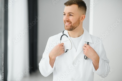 Young and confident male doctor portrait. Successful doctor career concept.