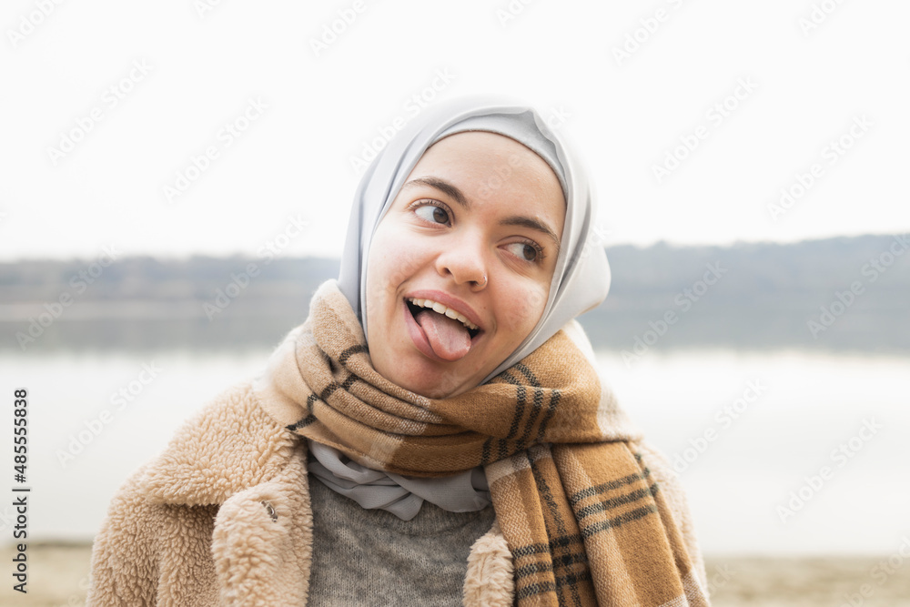Portrait of a young woman making silly faces Portrait of a young woman making silly faces