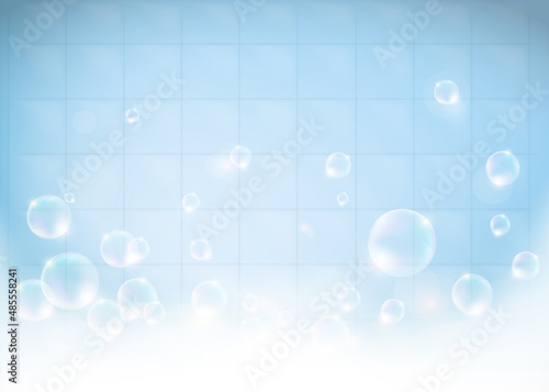 Foam with soap bubbles on the background of a bathroom or kitchen