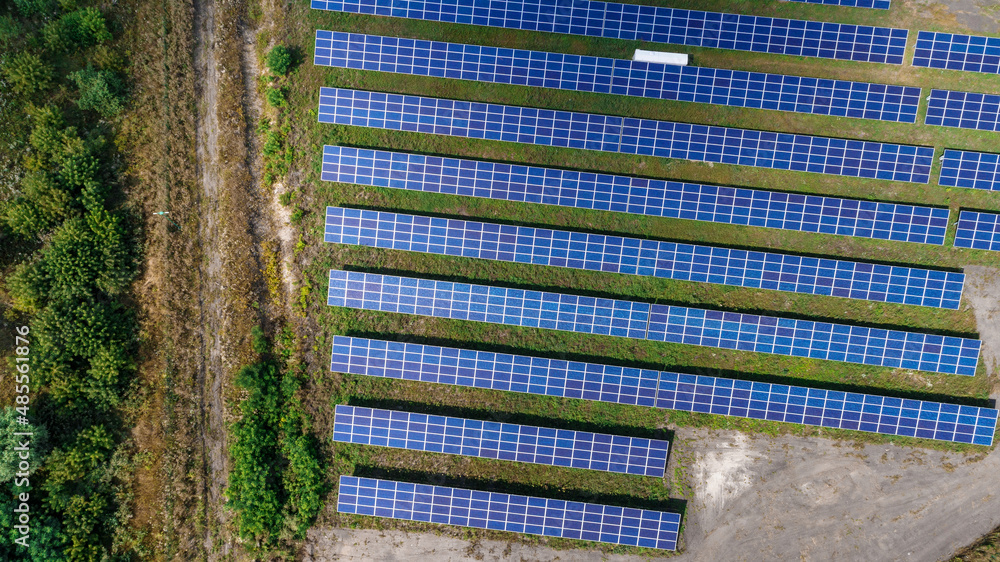 Solar panels in aerial view. Solar panels system power generators from sun Solar panels in aerial view. Solar panels system power generators from sun