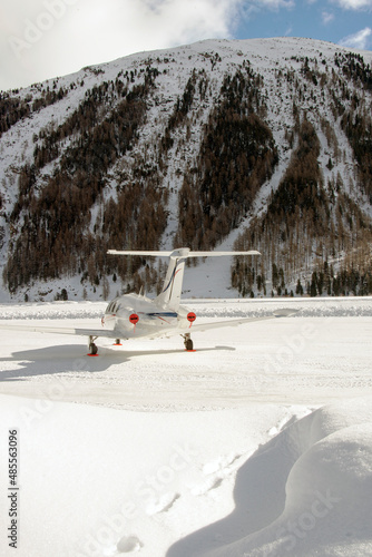 Private jets and aircrafts in the airport of Engadine St Moritz in winter time