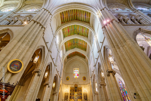 Interior of the Almudena Cathedral in the city of Madrid, columns, arches, ceilings and dome photo