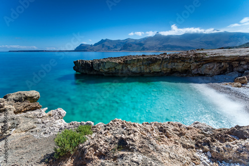 La piccola spiaggia Agliareddi all'interno della riserva naturale di Monte Cofano, Sicilia photo